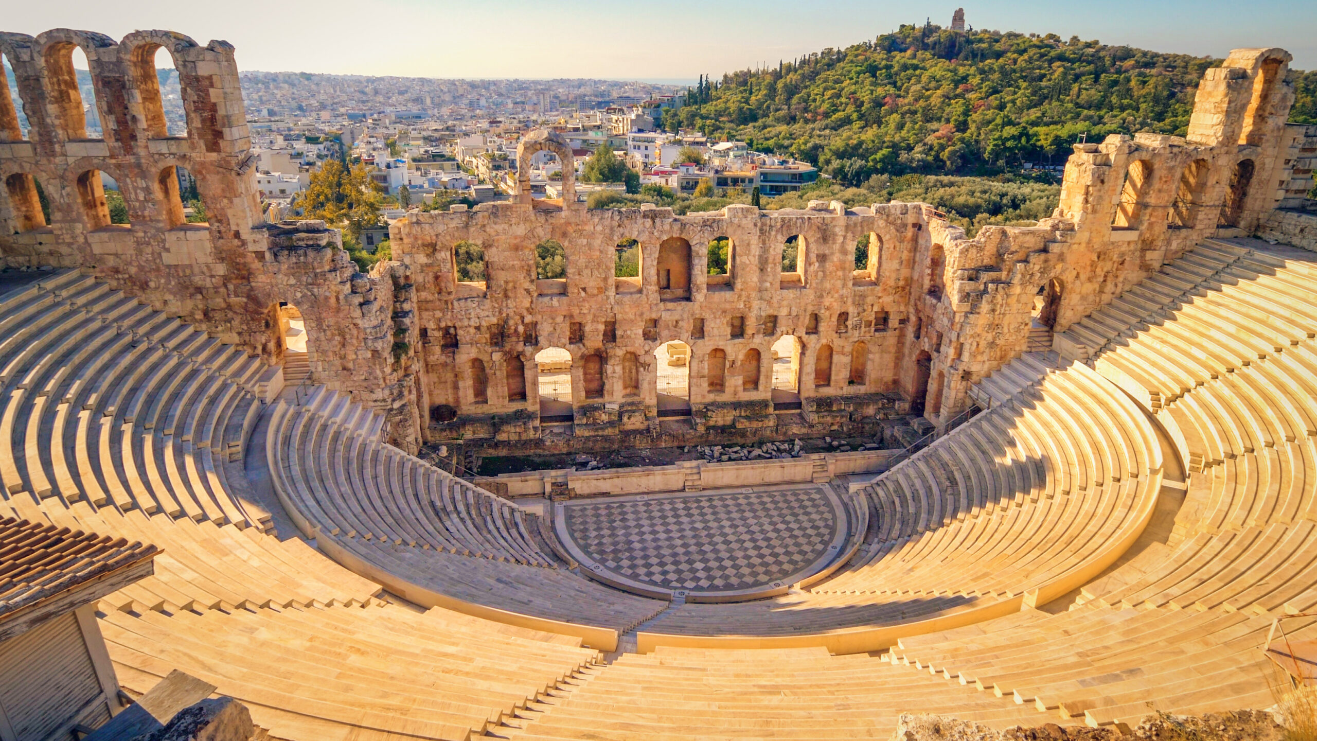 Theatre of Dionysus below the Acropolis in Athens, Greece is considered to be the worlds first theater aka Odeon of Herodes Atticus